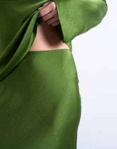 Model wearing Flood length maxi bias skirt in green