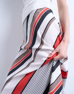 Model wearing Flood length maxi bias skirt in red and white stripe