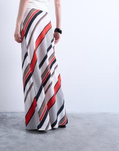 Model wearing Flood length maxi bias skirt in red and white stripe