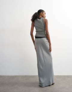 Model wearing Flood length satin bias maxi skirt in grey