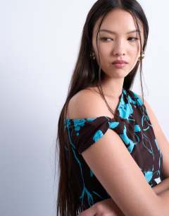 Model wearing Floral print one shoulder asymmetric top in brown