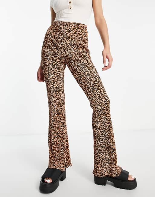 ASOS DESIGN plisse flare pants in animal print