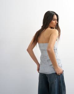 Model wearing Floral sequin bandeau in soft blue