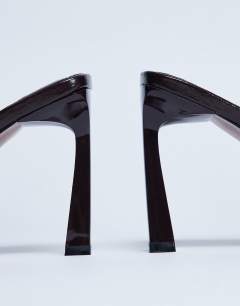 Model wearing Floyd strappy buckle detail square toe high heel in chocolate