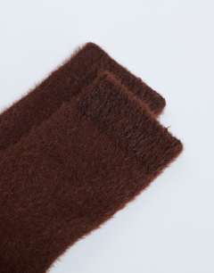 Model wearing Fluffy cosy sock in choc