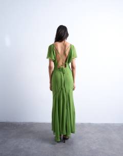 Model wearing Flutter sleeve godet hem midi dress in green
