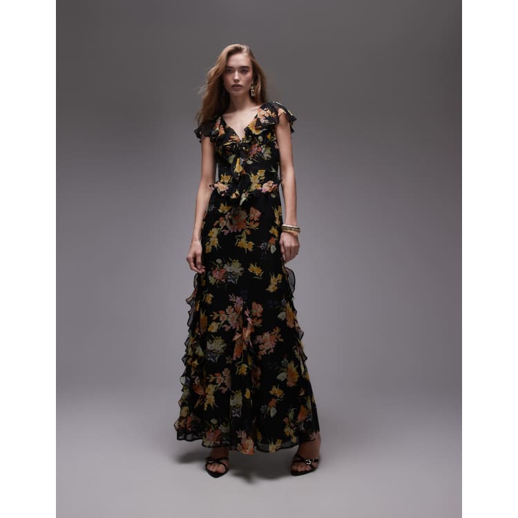 topshop midi dress with ruffles in ditsy floral Topshop flutter sleeve ruffle occasion midi dress in black base floral