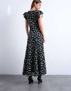 Model wearing Flutter sleeve v neck midi dress in mono spot