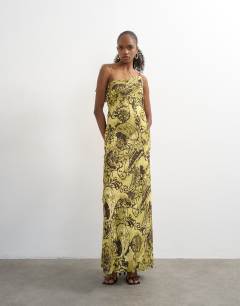 Model wearing Fold over bust maxi occasion dress in paisley floral