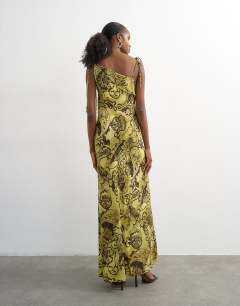 Model wearing Fold over bust maxi occasion dress in paisley floral
