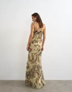 Model wearing Folded bust organza maxi dress in abstract blur print