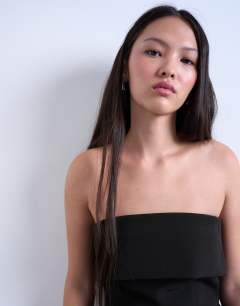 Model wearing Foldover long line top bandeau in black