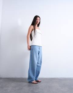 Model wearing Foldover long line top bandeau in ivory