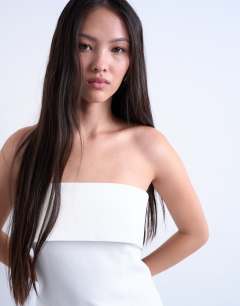 Model wearing Foldover long line top bandeau in ivory