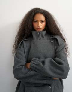 Model wearing Formal bomber in grey