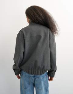 Model wearing Formal bomber in grey
