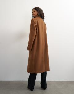 Model wearing Formal double breasted longline coat in toffee