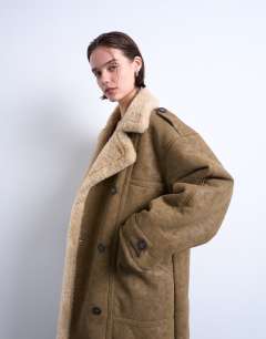 Model wearing Formal longline shearling coat in khaki