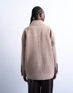 Model wearing Formal western jacket in mushroom