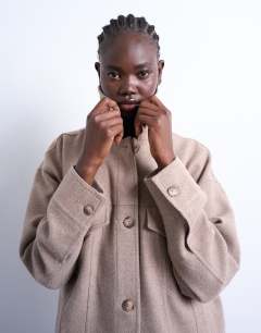 Model wearing Formal western jacket in mushroom
