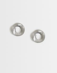 Model wearing Francis waterproof stainless steel round earrings in silver brushed