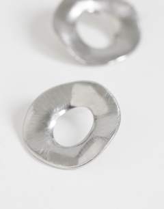 Model wearing Francis waterproof stainless steel round earrings in silver brushed