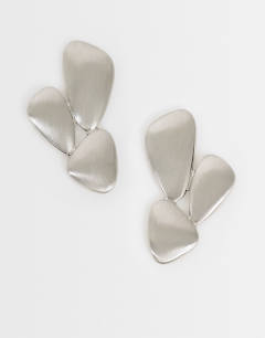 Model wearing Frankie brushed earring in silver