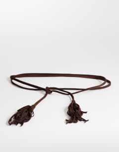 Model wearing Fringe cord suedette belt in chocolate