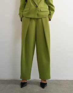 Model wearing Front pleat wide leg trouser in olive
