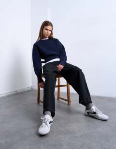 Model wearing Front seam detail balloon twill trouser in black