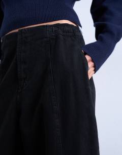 Model wearing Front seam detail balloon twill trouser in black