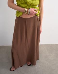 Model wearing Full circle cupro maxi skirt in chocolate