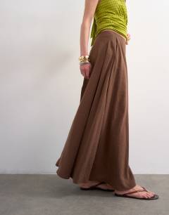 Model wearing Full circle cupro maxi skirt in chocolate