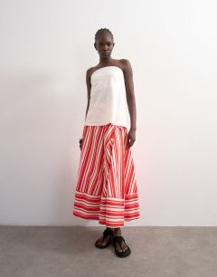Model wearing Full circle cut about maxi skirt in red and white stripe