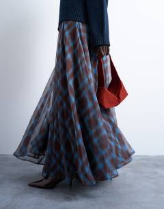 Model wearing Full circle maxi skirt in blue check