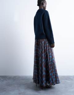 Model wearing Full circle maxi skirt in blue check