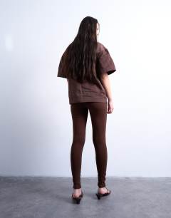 Model wearing Full length heavy weight legging in chocolate brown