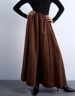 Model wearing Full maxi skirt in brown with black stripe