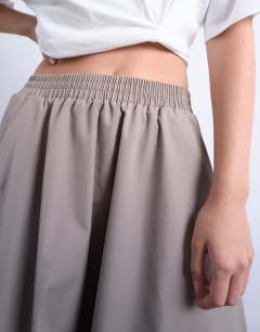 Model wearing Full midi skirt in beige