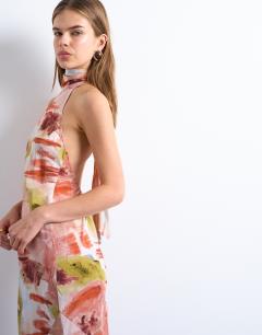 Model wearing Full neck halter midi dress in bold abstract floral