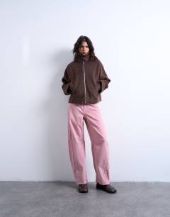 Model wearing Funnel boucle tab detail bomber in chocolate