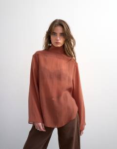 Funnel neck backwards long sleeve shirt in rust
