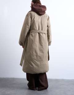 Model wearing Funnel neck longline belted puffer jacket in stone