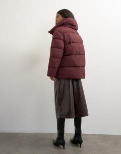 Model wearing Funnel neck mid length puffer jacket in burgundy