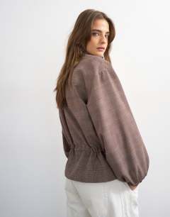 Model wearing Funnel neck nylon check anorak in multi