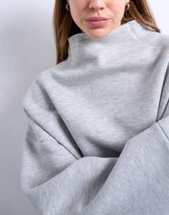 Model wearing Funnel neck oversized sweat in grey