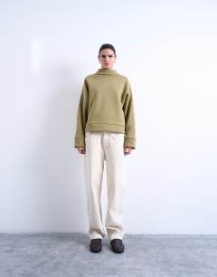Model wearing Funnel neck oversized sweat in khaki