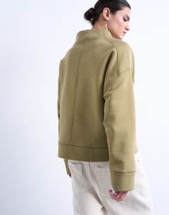 Model wearing Funnel neck oversized sweat in khaki