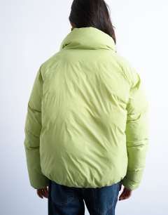 Model wearing Funnel neck puffer bomber jacket in leaf green