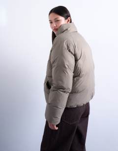 Model wearing Funnel neck puffer bomber jacket in mushroom